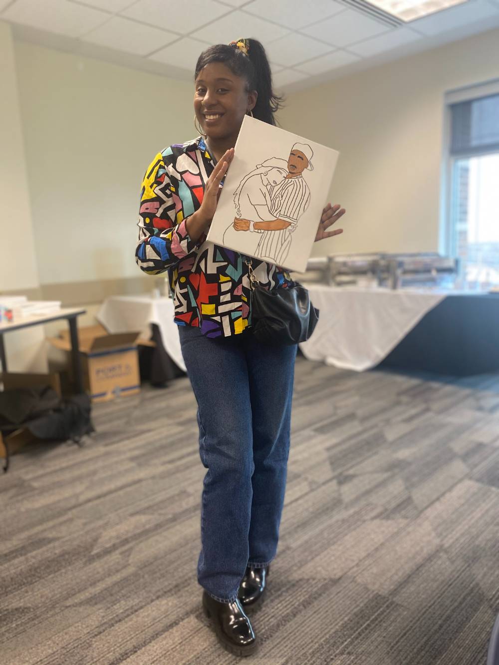 Program mentor posing with 90s themed clothing and photo